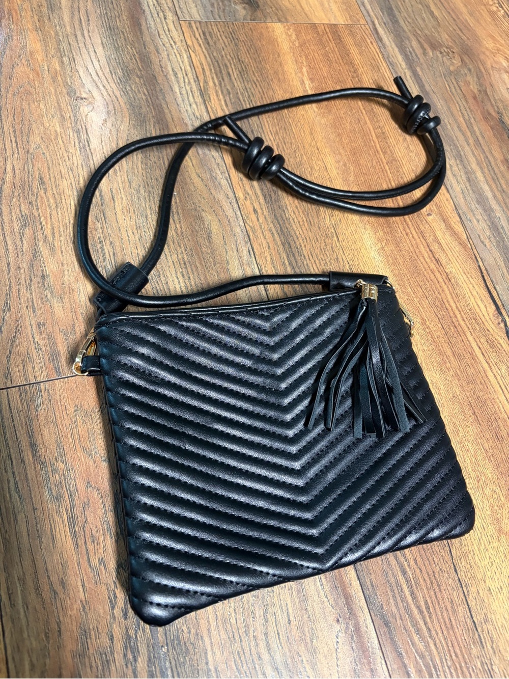 Black Quilted Chevron Crossbody with Tassel Accent